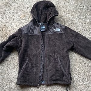 Brown fuzzy north face jacket